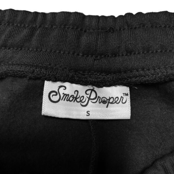 Black logo sweatpants (detail) by Smoke Proper